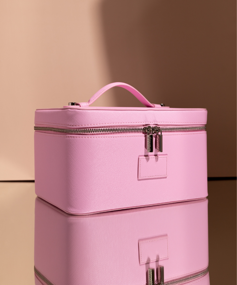 The Vanity Case in Lavender Pink.