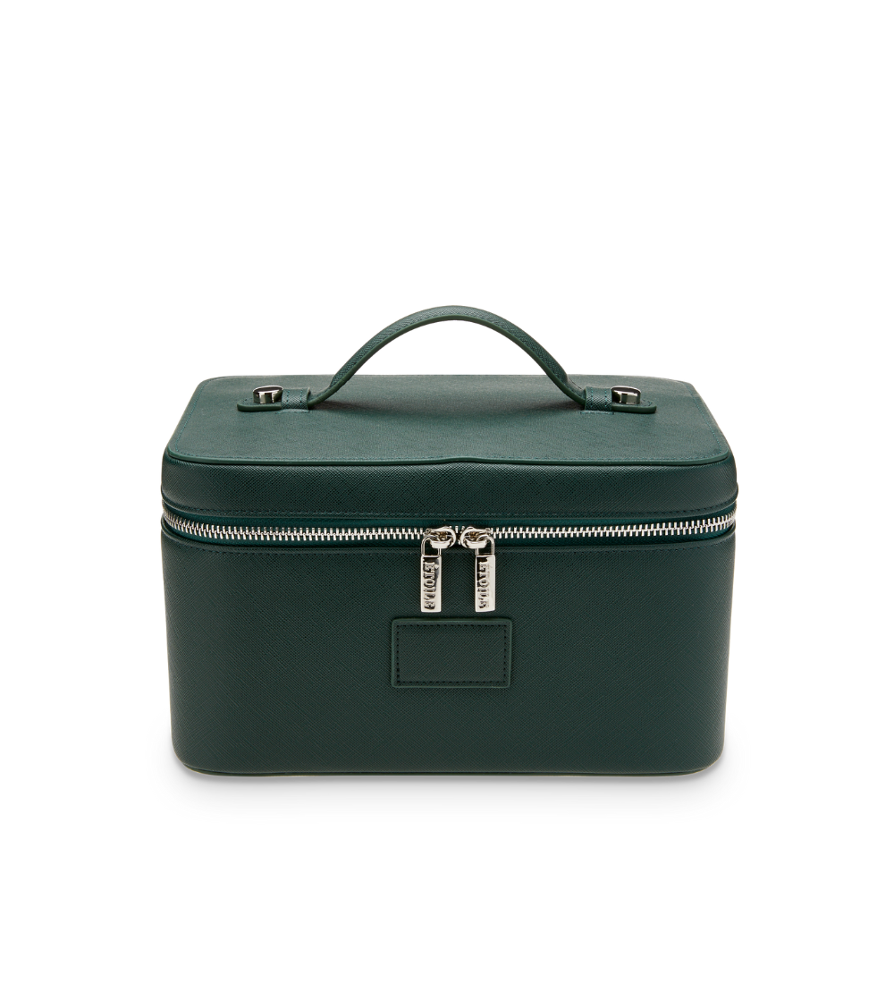 A structured vanity case with double zipperheads and a collapsible handle.